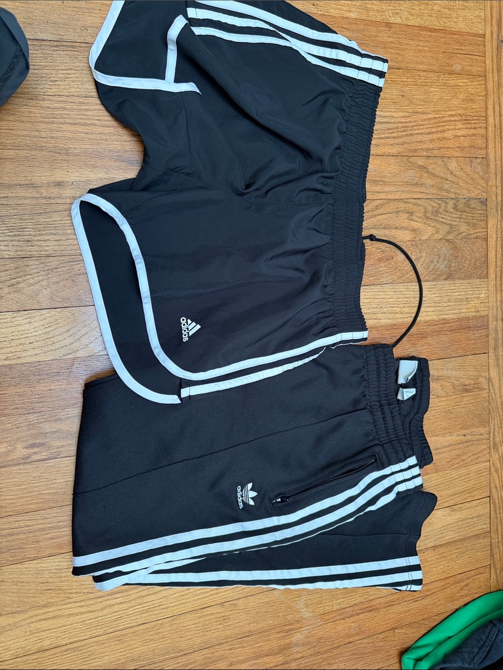 adidas Black womens  Athletic Shorts and pants  with White Stripe Trim